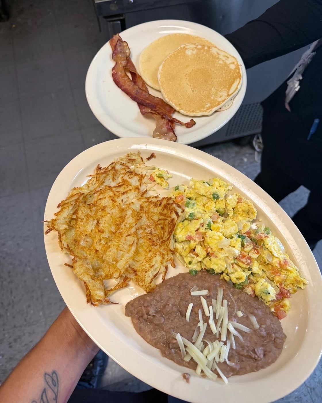 Machaca con huevo breakfast with hash browns, beans, pancakes and bacon at Maribu's in El Paso, TX 79938
